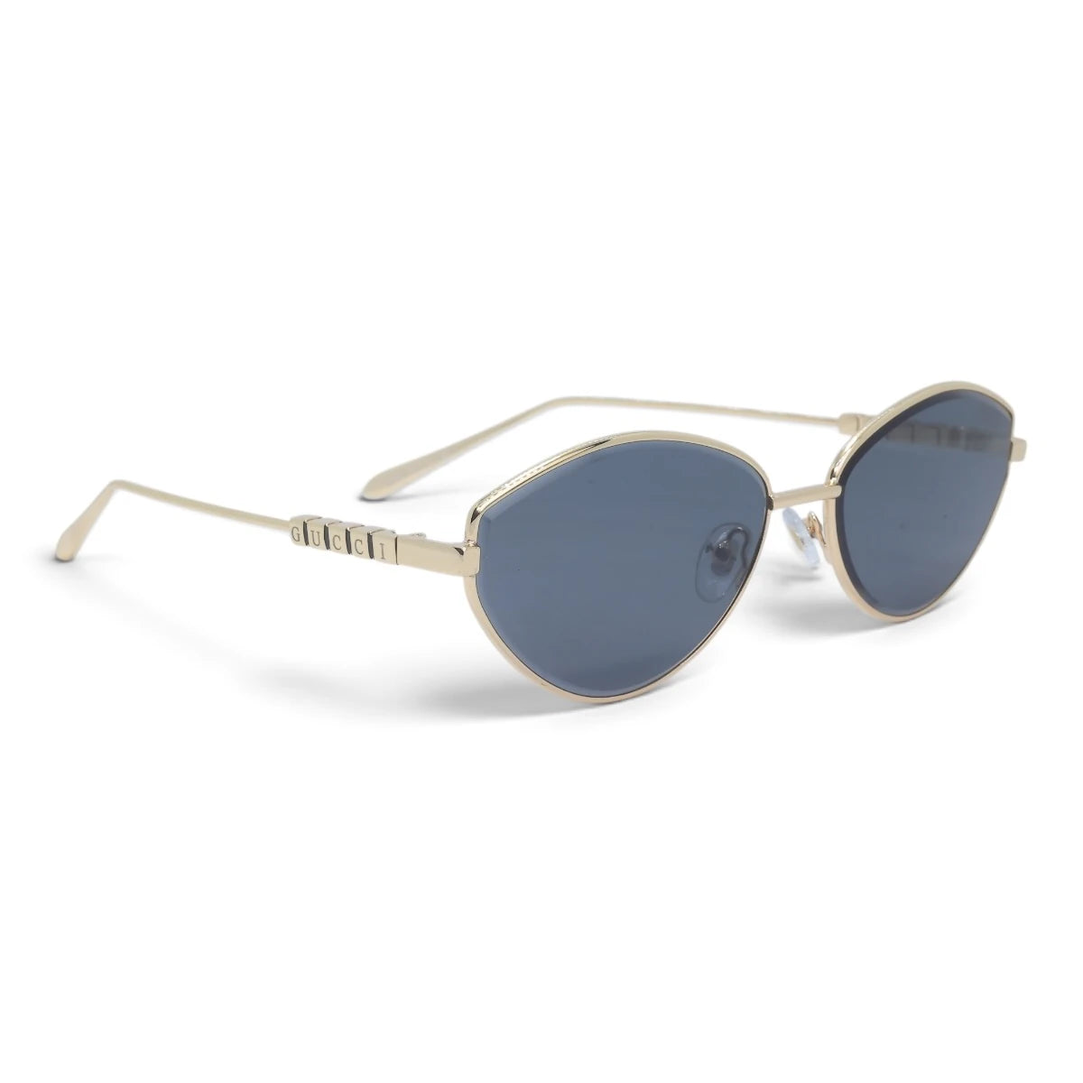 U&EYE The Elara soft cat-eye sunglasses in Gold / Slate Blue — angled view
