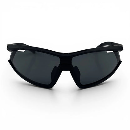 The Glide Sport Shield sunglasses in Black with Smoke lenses, angled three-quarter view