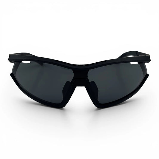 The Glide Sport Shield sunglasses in Black with Smoke lenses, angled three-quarter view