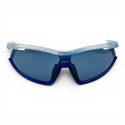 The Glide Sport Shield sunglasses in White with Blue lenses, angled three-quarter view