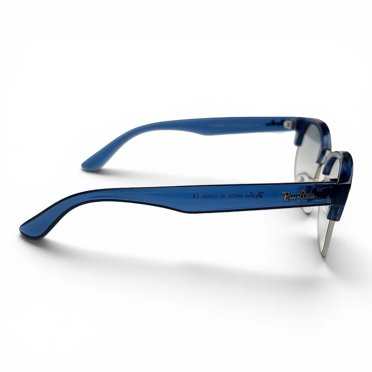 The Kellan Browline Square sunglasses in Blue with Gray Gradient lenses, side profile view