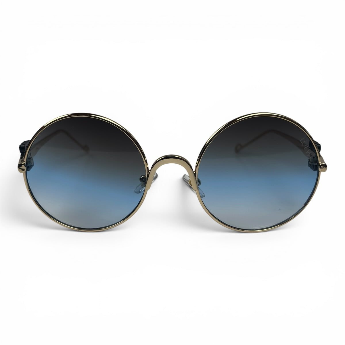 The Liora Round sunglasses in Gold with Blue Gradient lenses, straight front view