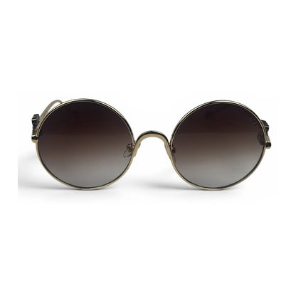The Liora Round sunglasses in Gold with Brown Gradient lenses, straight front view