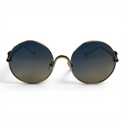 The Liora Round sunglasses in Gold with Green Gray lenses, straight front view