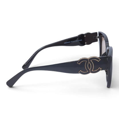 U&EYE The Marais cat-eye sunglasses in Black / Champagne — side view