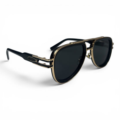 The Marlow Double-Bridge Square sunglasses in Black Gold with Dark Gray lenses, angled three-quarter view