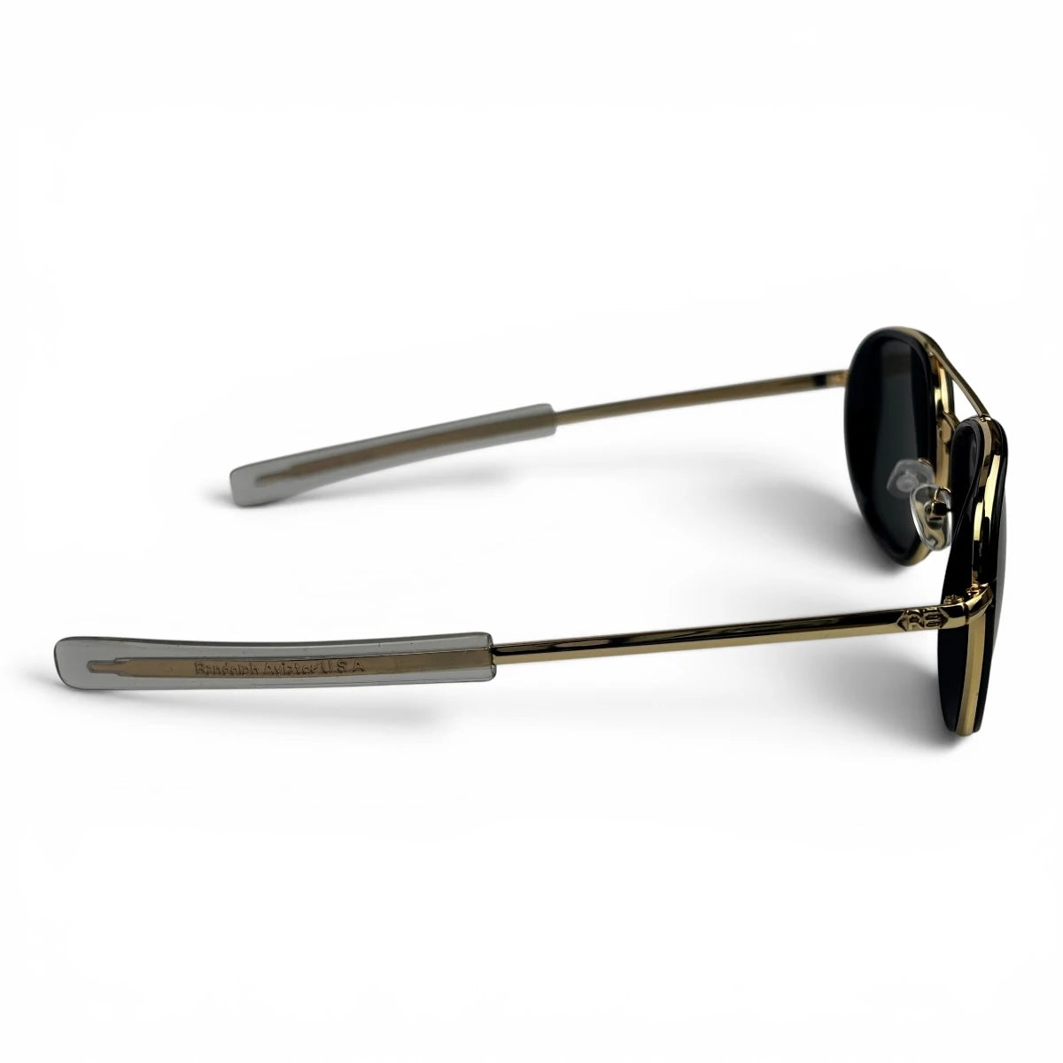 The Rayan Metal Rectangle sunglasses in Gold and Black with Black lenses, side profile view