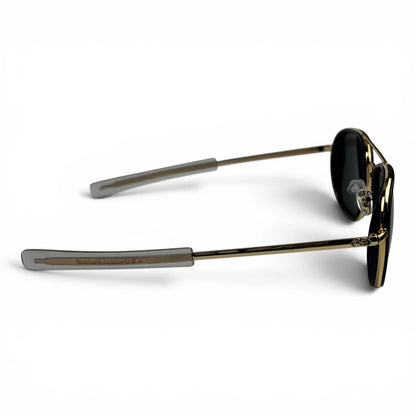 The Rayan Metal Rectangle sunglasses in Gold and Black with Black lenses, side profile view