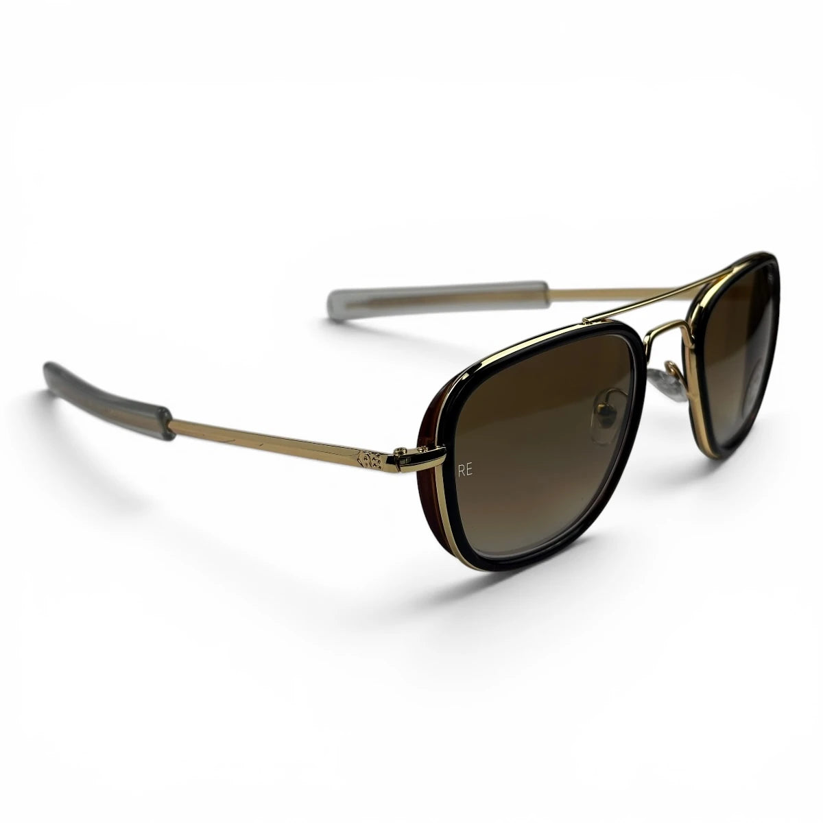 The Rayan Metal Rectangle sunglasses in Gold with Light Brown lenses, straight front view