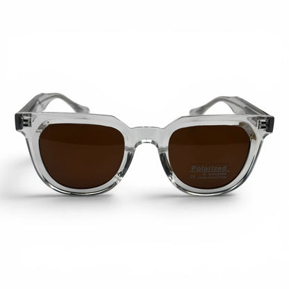 The Roux Chunky Square sunglasses in Clear with Brown lenses, angled three-quarter view