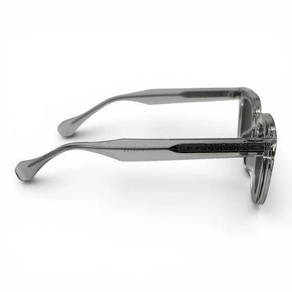 The Roux Chunky Square sunglasses in Clear with Brown lenses, side profile view