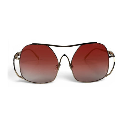 The Solene Oversized Square sunglasses in Gold with Rose Gradient lenses, straight front view
