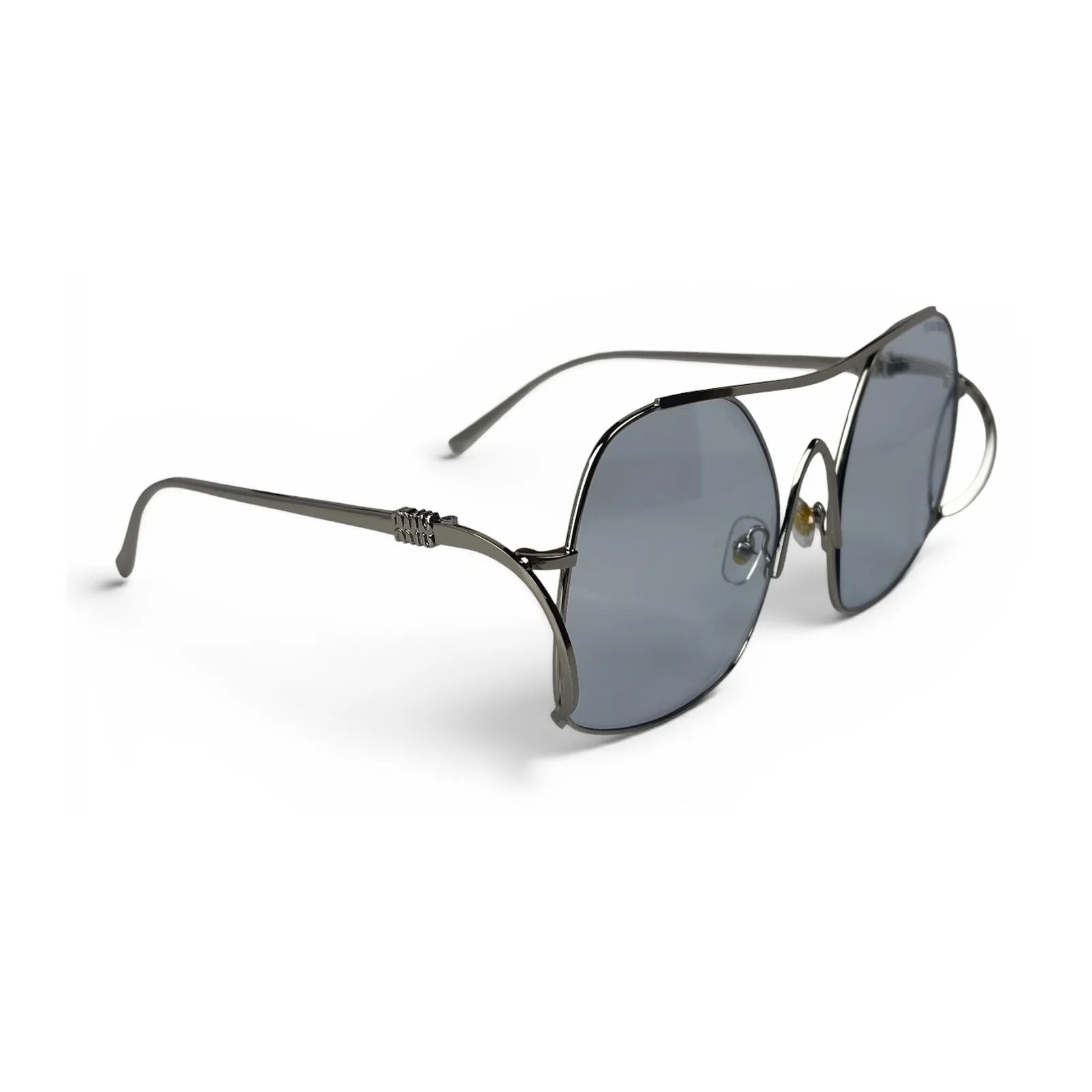 The Solene Oversized Square sunglasses in Silver with Light Blue lenses, angled three-quarter view