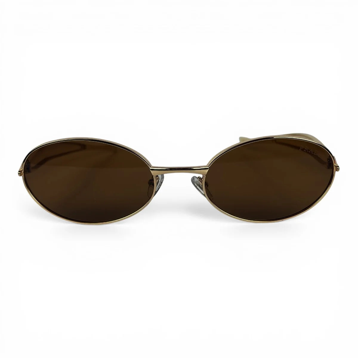 The Aveline oval sunglasses in gold with brown lenses, straight front view