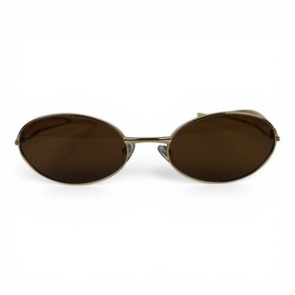 The Aveline oval sunglasses in gold with brown lenses, straight front view