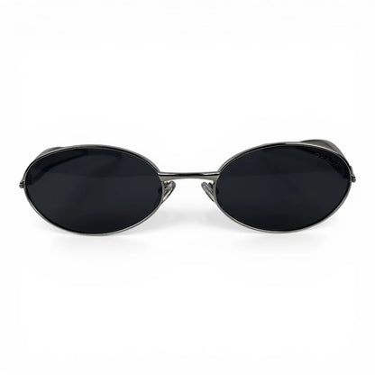 The Aveline oval sunglasses in silver with black lenses, straight front view