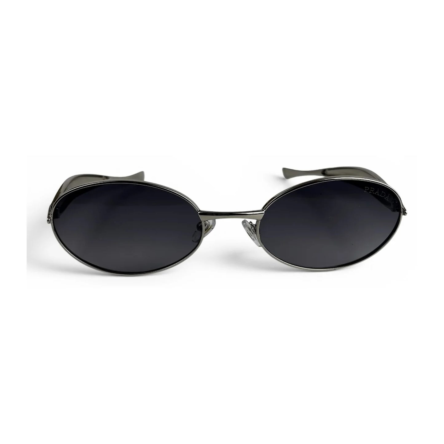 The Aveline oval sunglasses in silver with black lenses, straight front view