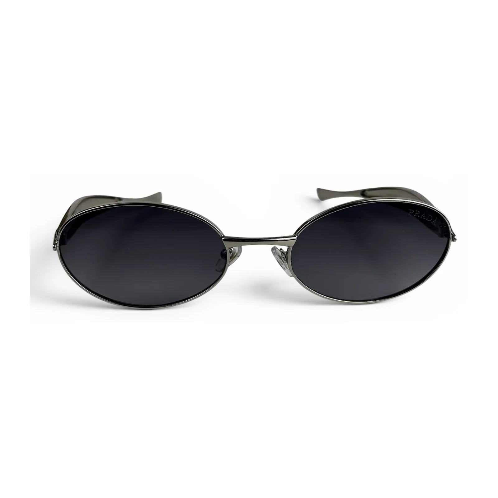 The Aveline oval sunglasses in silver with black lenses, straight front view
