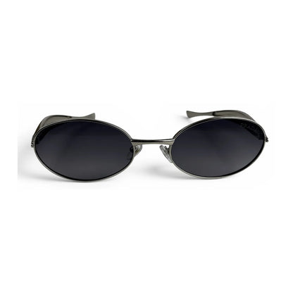 The Aveline oval sunglasses in silver with black lenses, straight front view