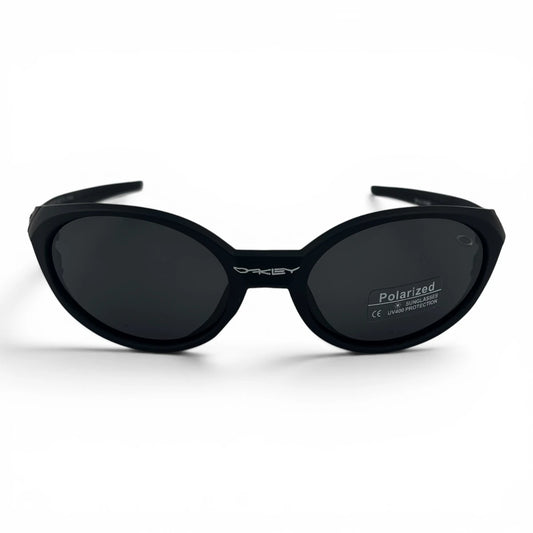 The Vortex Sport Wrap sunglasses in Black with Smoke lenses, angled three-quarter view