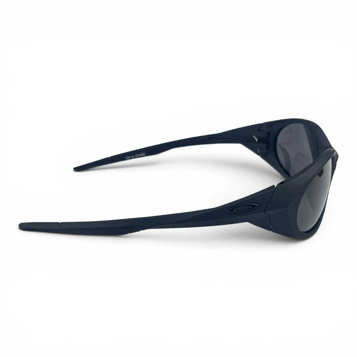 The Vortex Sport Wrap sunglasses in Black with Smoke lenses, side profile view