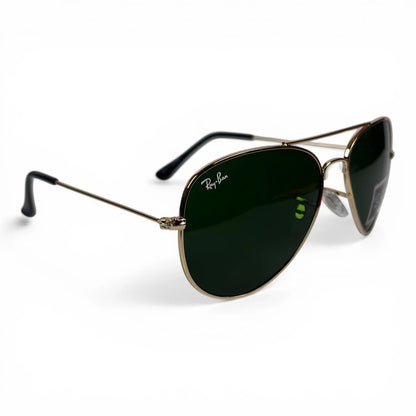 The Vela aviator sunglasses in gold with green lenses, angled three-quarter view