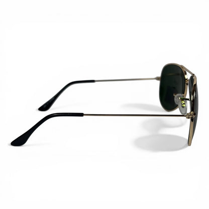 The Vela aviator sunglasses in gold with green lenses, side profile view